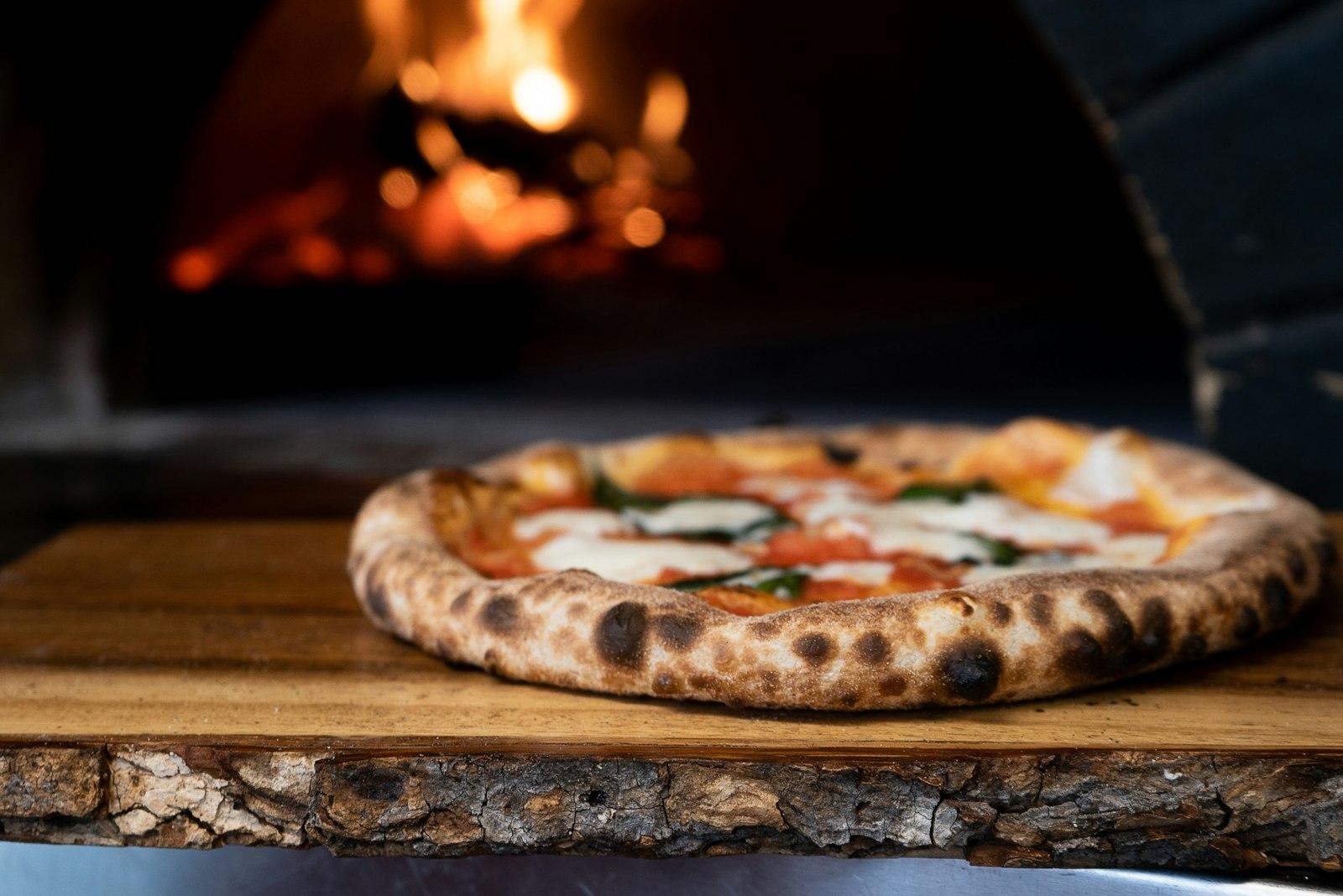 Pizza On Brown Wooden Table jigsaw puzzle preview