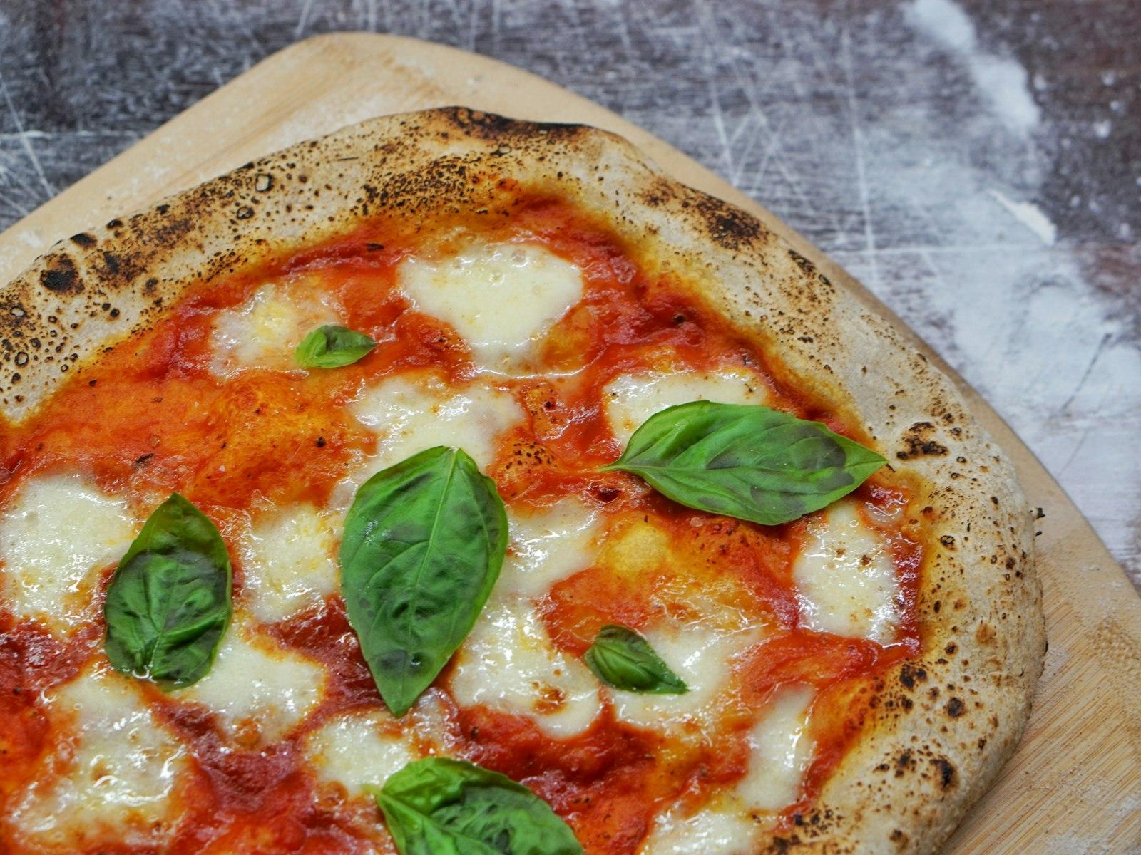 Pizza With Green Leaf On Top jigsaw puzzle preview