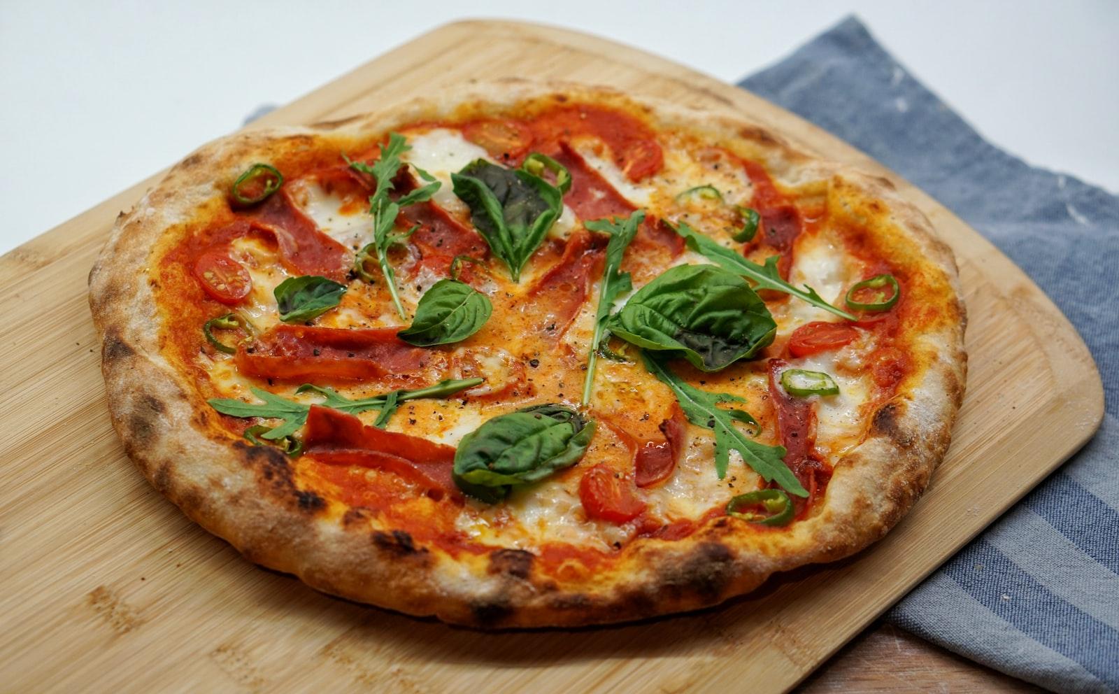 Pizza With Green Leaves And Red Sauce jigsaw puzzle preview