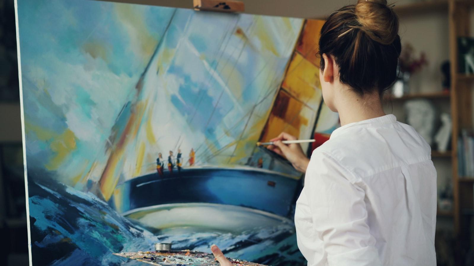 Skilled Artist Pretty Woman Is Painting Seascape S jigsaw puzzle preview
