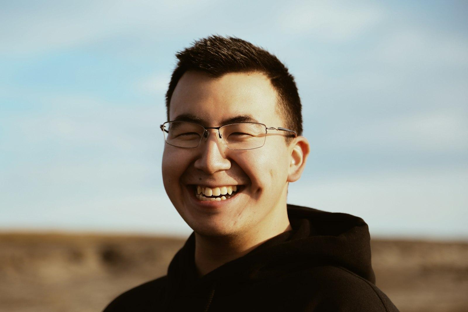 Smiling Man Wearing Black Pullover Hoodie jigsaw puzzle preview
