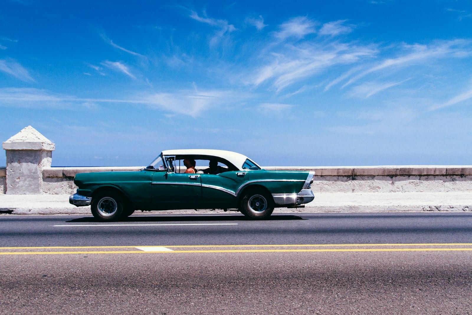 Turquoise Vintage Car On A Bridge jigsaw puzzle preview