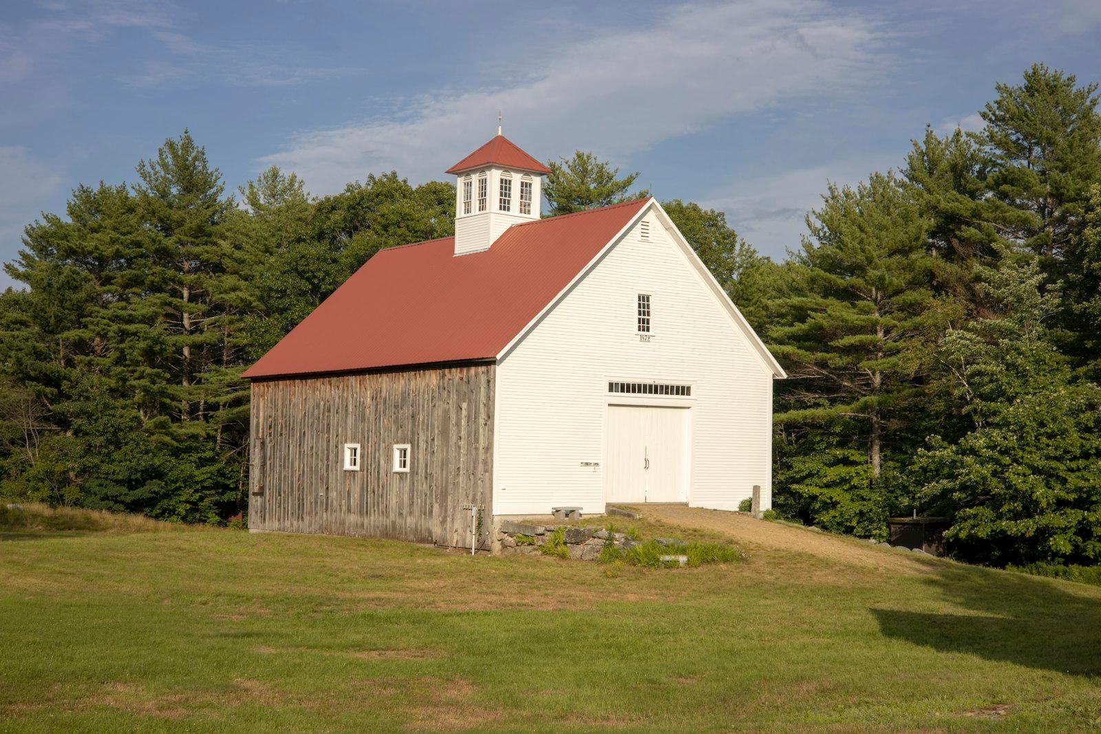 White And Red Wooden House On Green Grass Field Un jigsaw puzzle preview