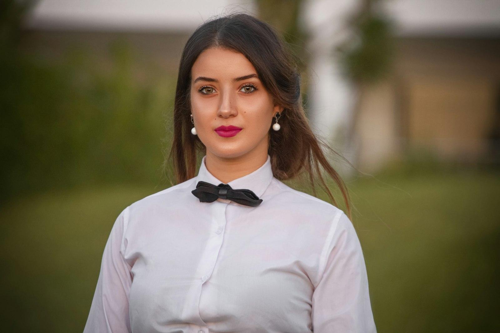 Woman In White Dress Shirt And Black Bowtie jigsaw puzzle preview