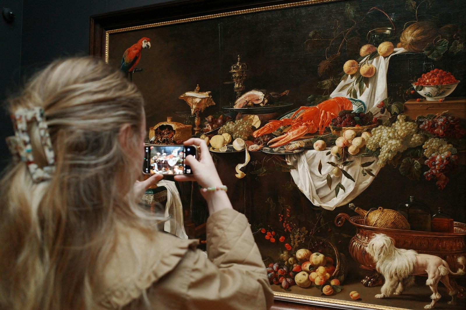 Woman Photographs A Detailed Still Life Painting jigsaw puzzle preview