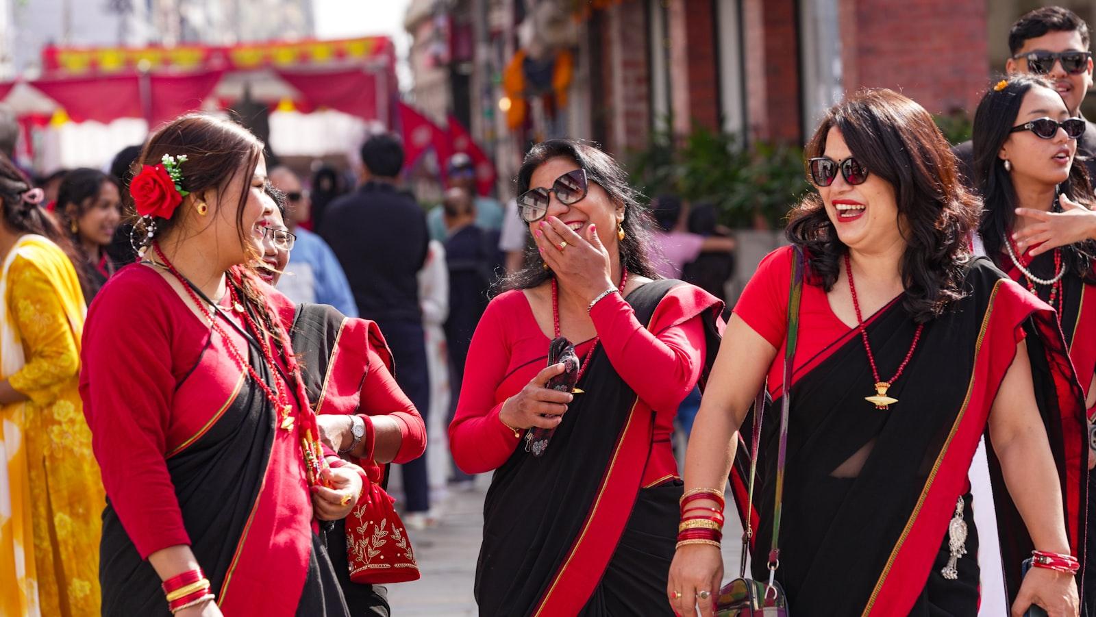 Women In Traditional Red And Black Attire Laughing jigsaw puzzle preview
